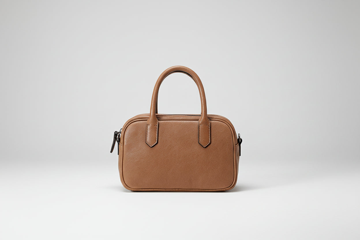 Brown handbag on a white background