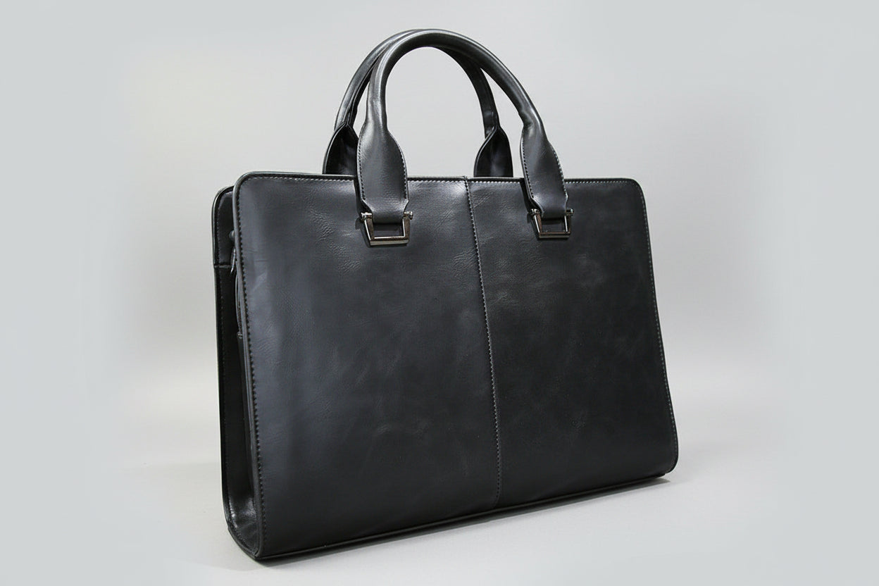 Black leather briefcase on a white background