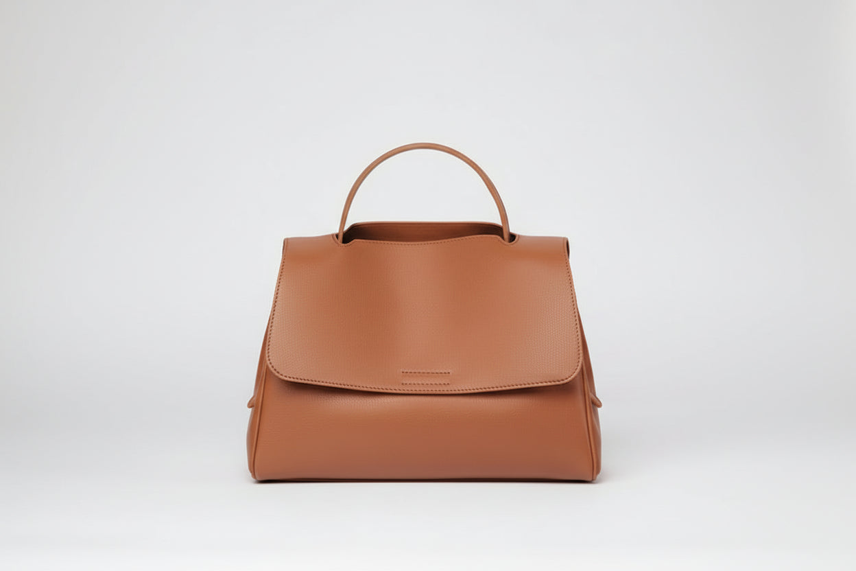 Brown handbag with dimensions labeled on a white background