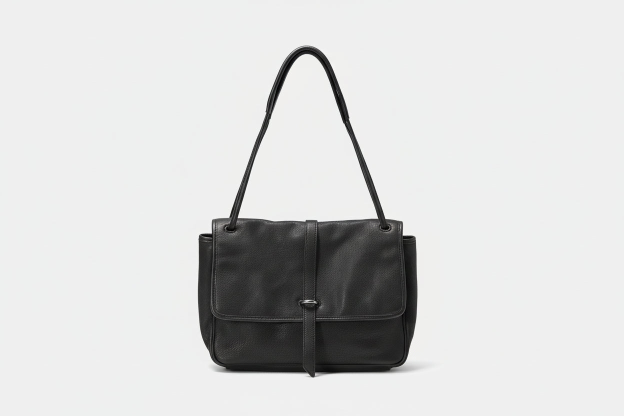 Black leather shoulder bag on a white background